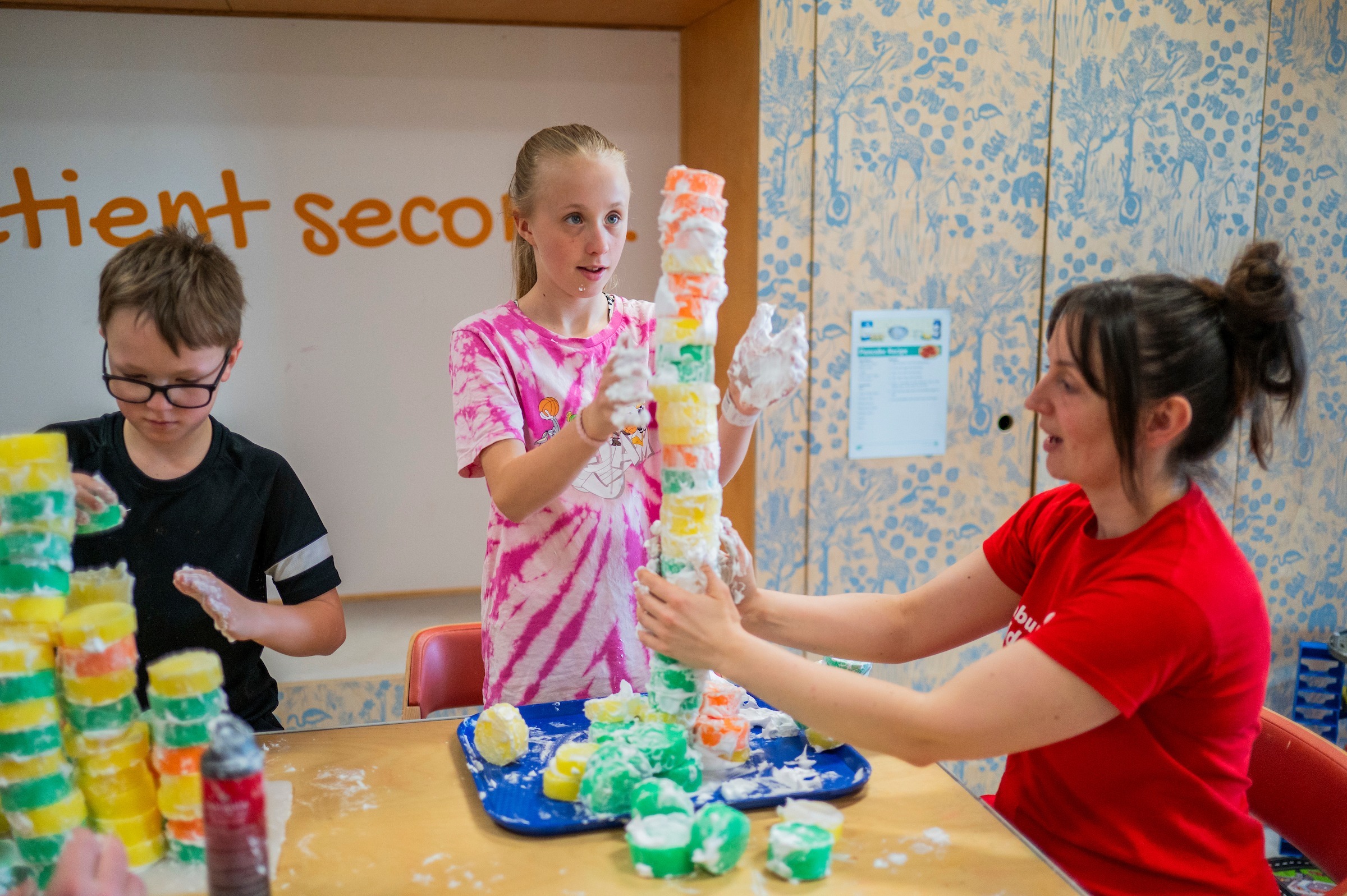 A child builds a tower at the Edinburgh Children's Hospital.
