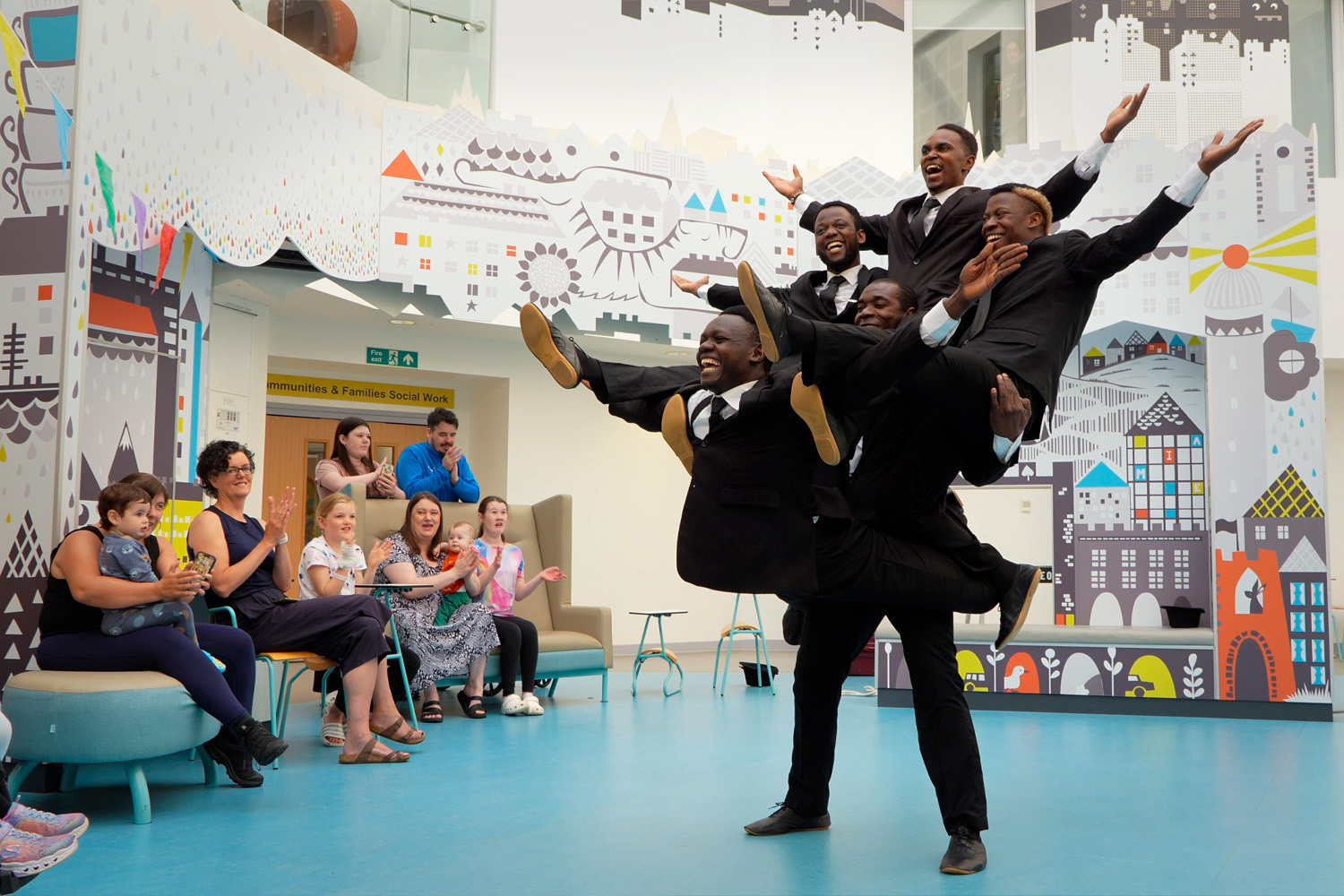 A human pyramid of Fringe acrobats performing at the Edinburgh Children's Hospital.
