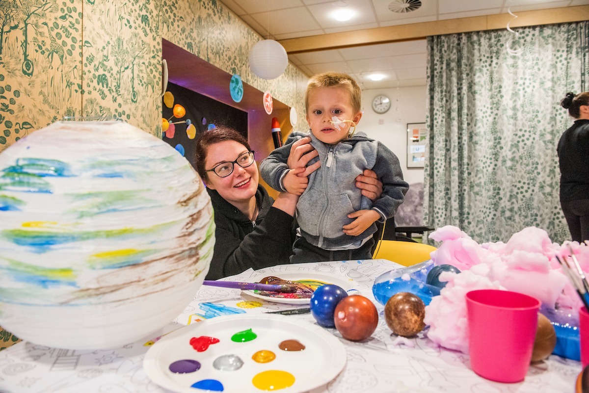 A child makes an art project at the Edinburgh Children's Hospital.